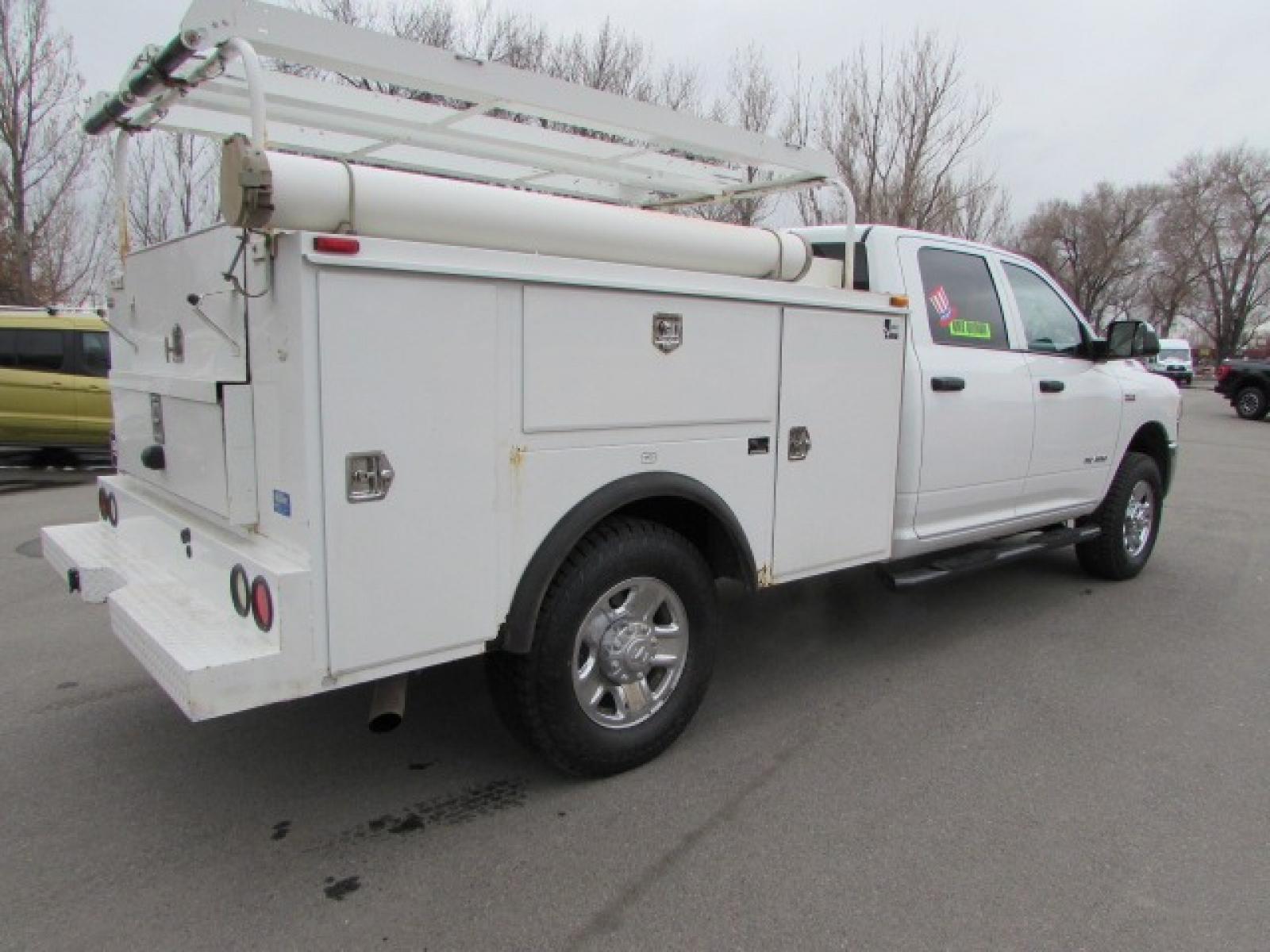2020 White /Gray RAM 3500 Tradesman Crew Cab 4WD (3C63R3GJ0LG) with an 6.4L V8 OHV 16V engine, 8 speed automatic transmission, located at 4562 State Avenue, Billings, MT, 59101, (406) 896-9833, 45.769516, -108.526772 - Photo #3